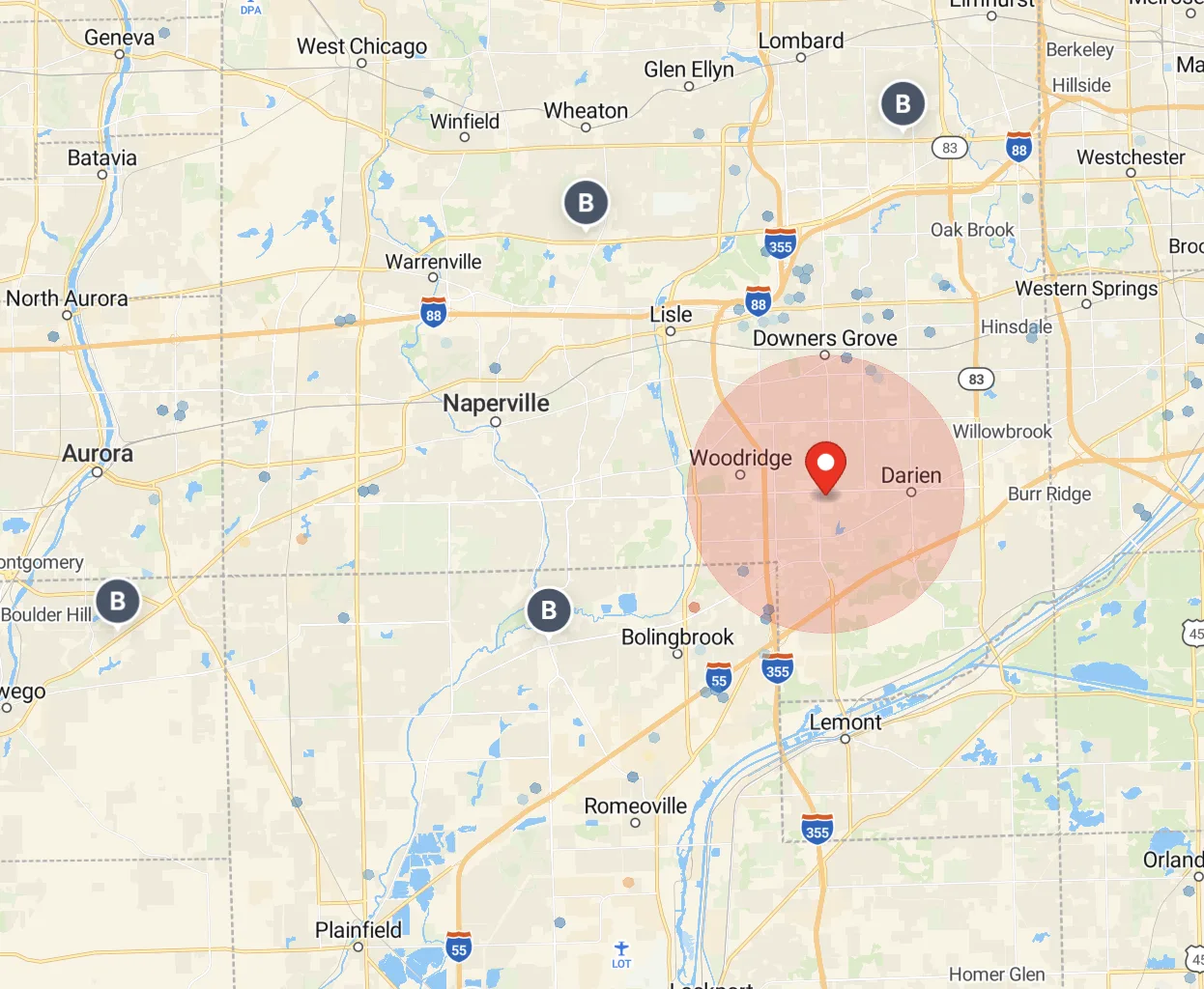 Suburban Chicago (Darien). A larger circle covers the entire Woodridge-Darien-Willowbrook triangle. Suburban radius widened to capture the wider commute pattern.