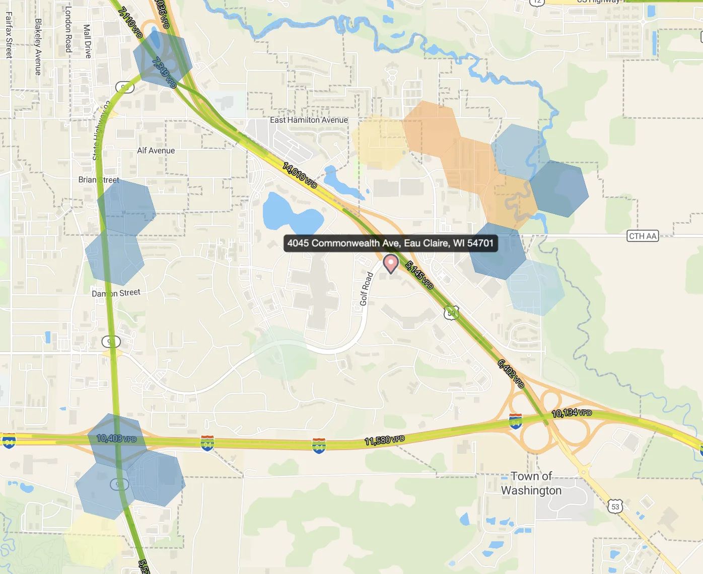 Eau Claire, WI. The conversion sits in a low-fit corridor with a warm cluster northeast that the model would have indexed toward first. The conversion is not in the warm cluster.