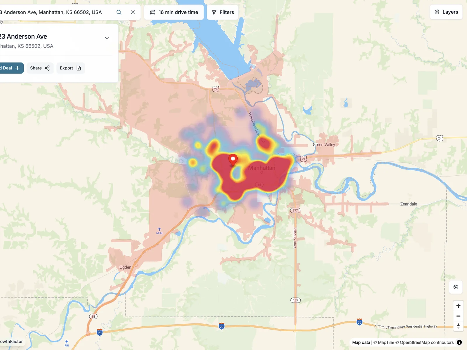Foot-traffic heatmap layer over Manhattan, KS, with the candidate pin sitting at the edge of the hottest corridor.