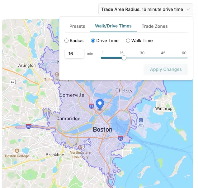 GrowthFactor platform showing a drive-time polygon trade area that follows the actual road network, producing an irregular shape unlike a simple radius