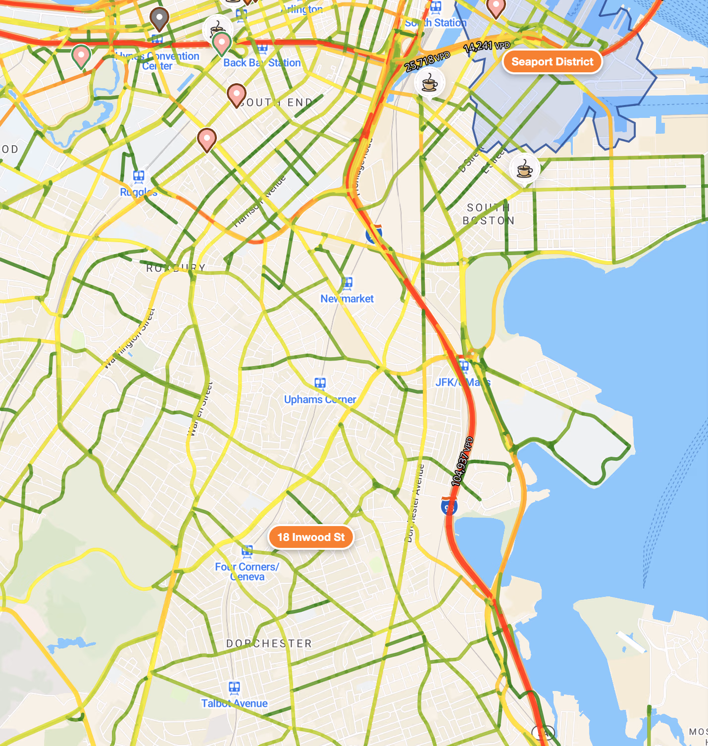 Vehicle traffic over Boston: every road segment colored by daily volume, with vehicles-per-day labels on the busiest.